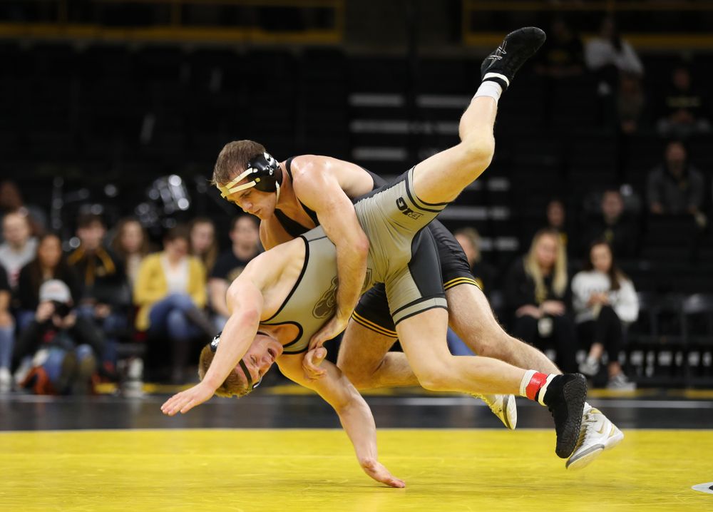Iowa's Carter Happel wrestles Purdue's Parker Filius at 149 pounds Saturday, November 24, 2018 at Carver-Hawkeye Arena. (Brian Ray/hawkeyesports.com)