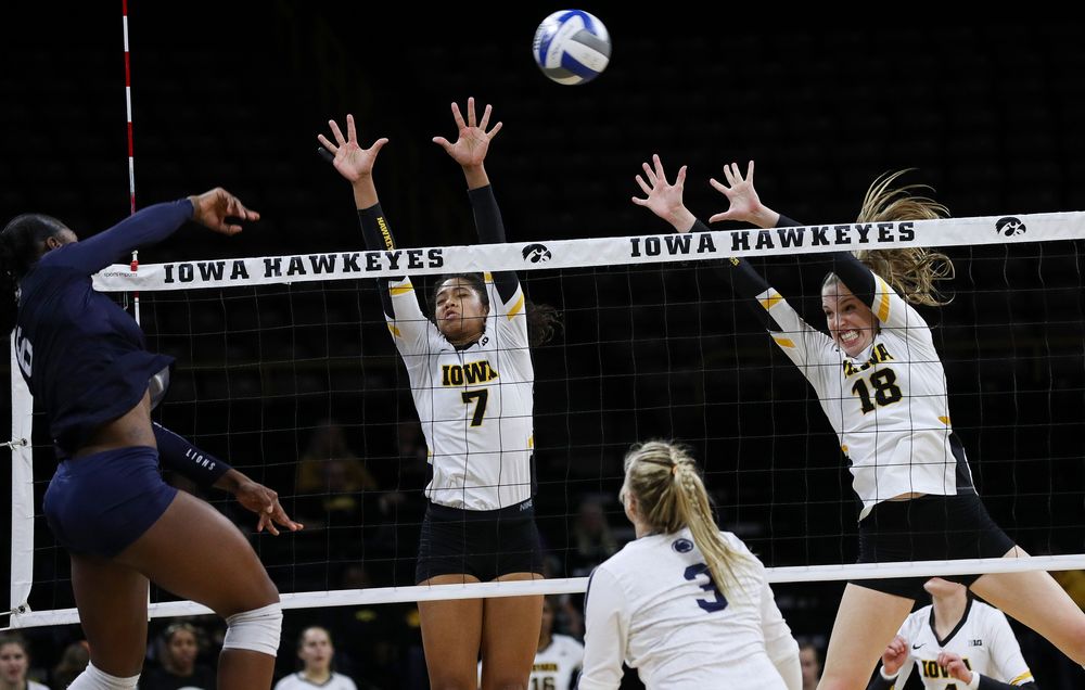 Iowa Hawkeyes setter Brie Orr (7) and Iowa Hawkeyes middle blocker Hannah Clayton (18) go up for a block during a match against Penn State at Carver-Hawkeye Arena on November 3, 2018. (Tork Mason/hawkeyesports.com)