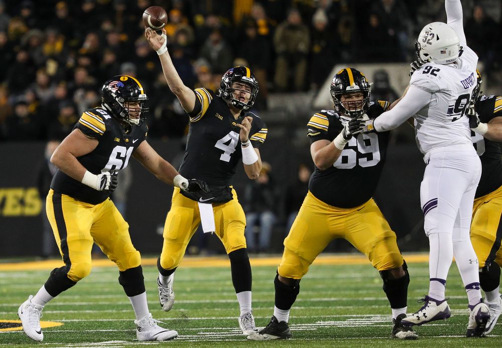 Iowa Hawkeyes quarterback Nate Stanley (4) passes the ball during a game against Northwestern at Kinnick Stadium on November 10, 2018. (Tork Mason/hawkeyesports.com)