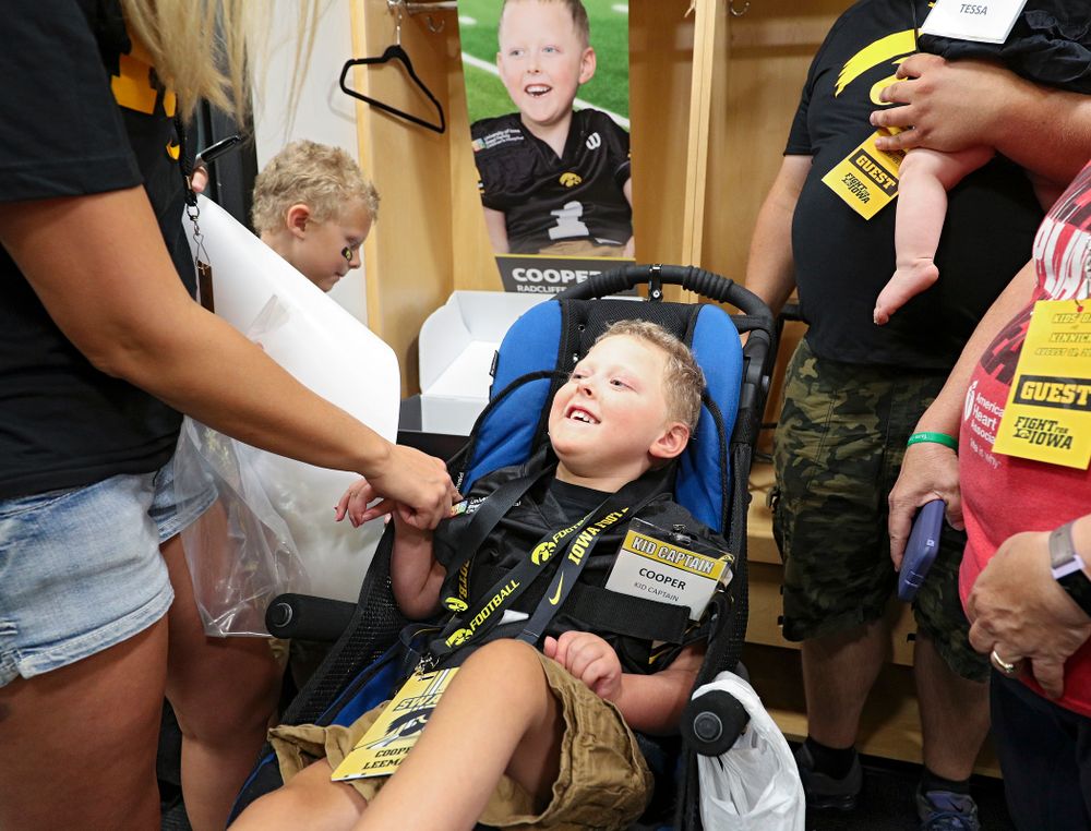 Kid Captain Cooper Leeman at his locker during Kids Day at Kinnick Stadium in Iowa City on Saturday, Aug 10, 2019. (Stephen Mally/hawkeyesports.com)