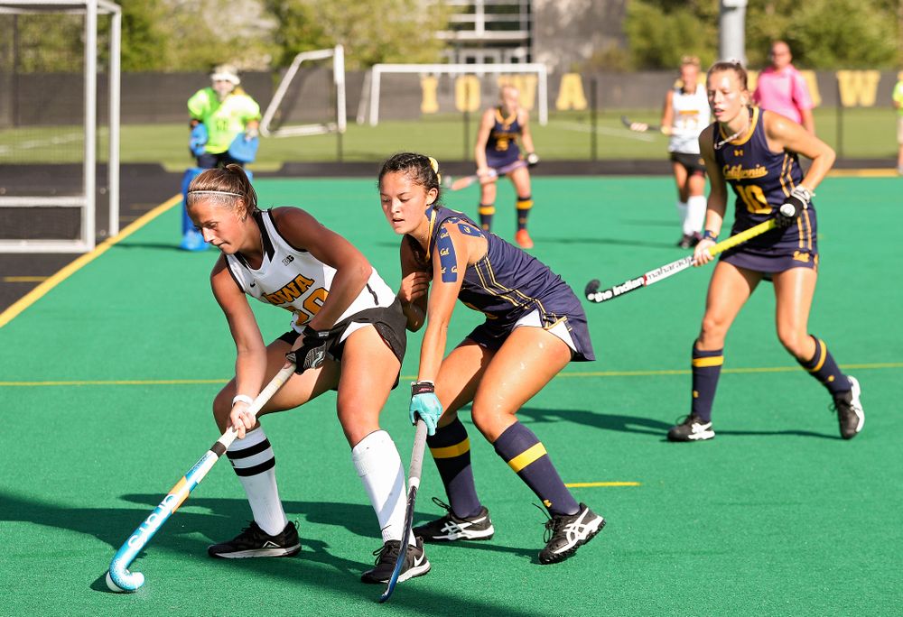Iowa’s Sophie Sunderland (20) moves with the ball during the fourth quarter of their game at Grant Field in Iowa City on Friday, Sep 13, 2019. (Stephen Mally/hawkeyesports.com)