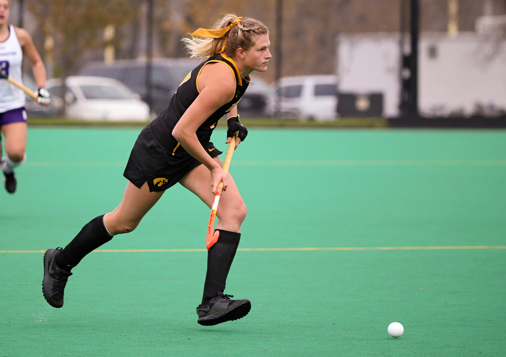 Iowa’s Ellie Holley (7) looks down field as she moves with the ball during the third quarter of their game at Grant Field in Iowa City on Saturday, Oct 26, 2019. (Stephen Mally/hawkeyesports.com)