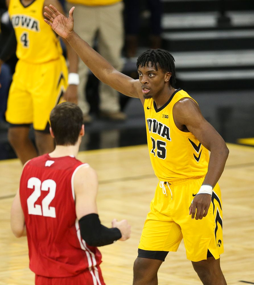 Iowa Hawkeyes forward Tyler Cook (25) pumps up the crowd after a made basket against Wisconsin on November 30, 2018 at Carver-Hawkeye Arena. (Tork Mason/hawkeyesports.com)
