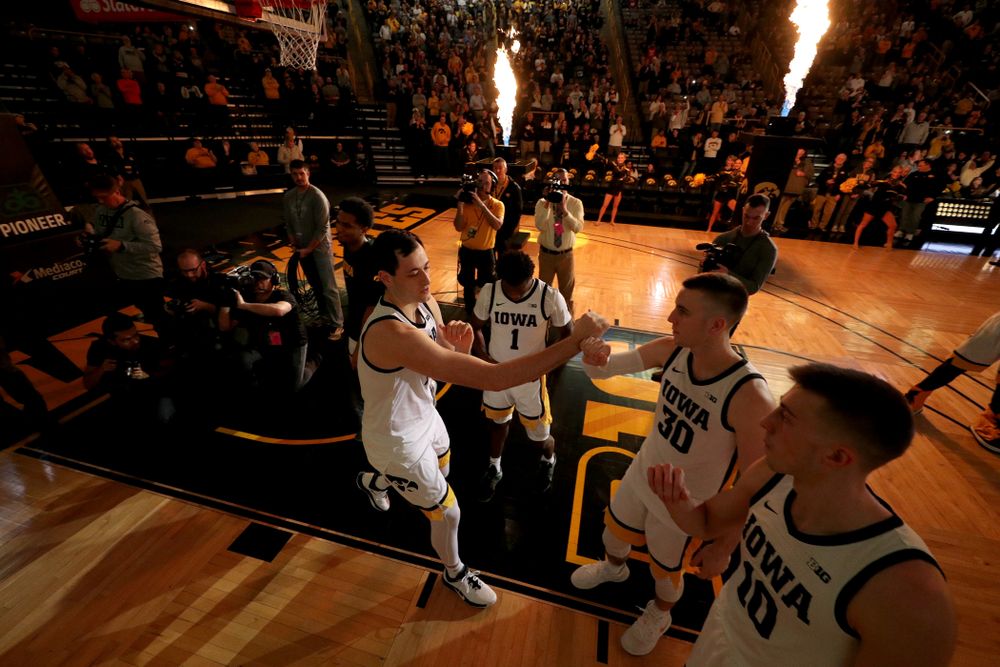 Iowa Hawkeyes forward Ryan Kriener (15) and guard Connor McCaffery (30) against the Maryland Terrapins Friday, January 10, 2020 at Carver-Hawkeye Arena. (Brian Ray/hawkeyesports.com)