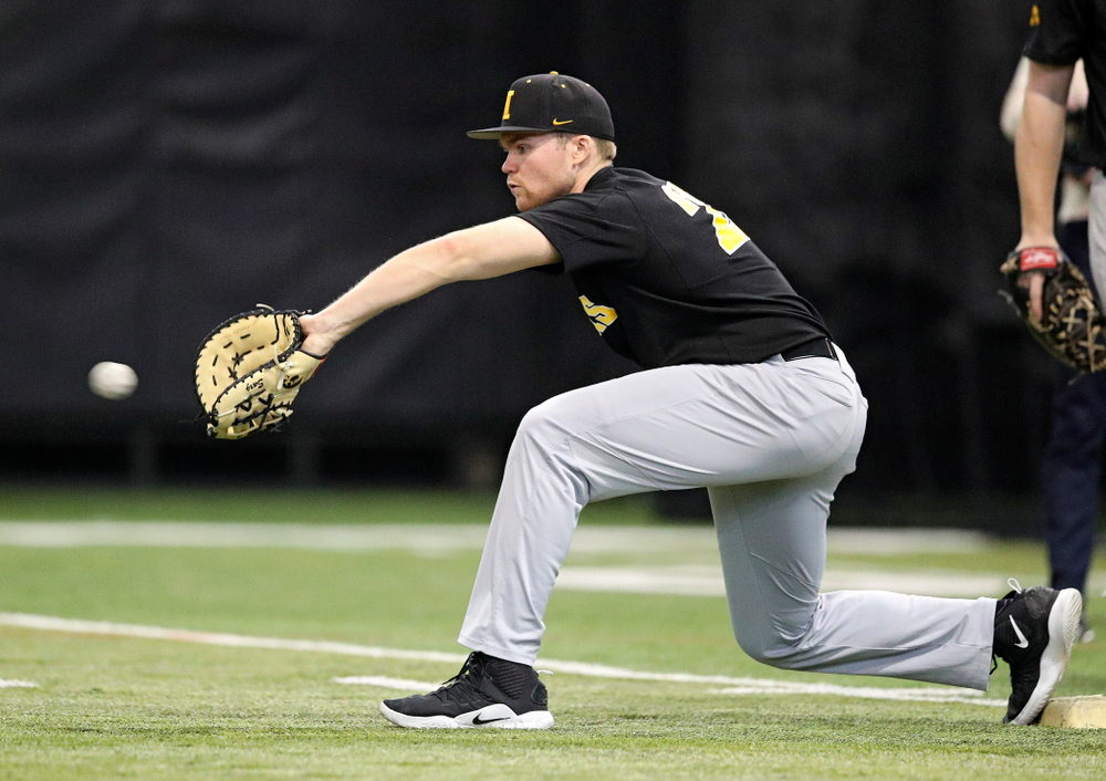 Iowa Hawkeyes first baseman Tanner Padgett (22) pulls in a throw during practice at the Hansen Football Performance Center in Iowa City on Friday, January 24, 2020. (Stephen Mally/hawkeyesports.com)