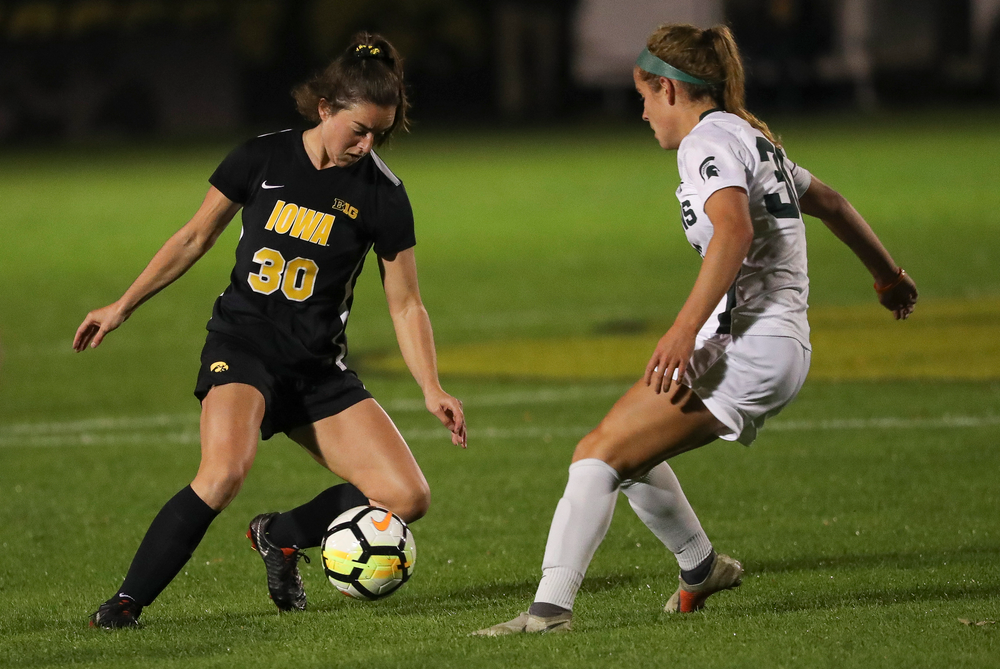 Iowa Hawkeyes forward Devin Burns (30) dribbles the ball during a game against Michigan State at the Iowa Soccer Complex on October 12, 2018. (Tork Mason/hawkeyesports.com)