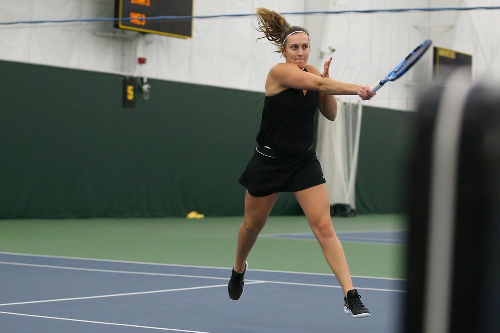 Iowa’s Ashleigh Jacobs returns a ball during the Iowa women’s tennis meet vs UNI on Saturday, February 29, 2020 at the Hawkeye Tennis and Recreation Complex. (Lily Smith/hawkeyesports.com)