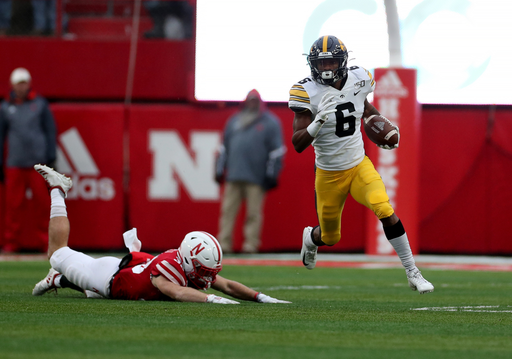 Iowa Hawkeyes wide receiver Ihmir Smith-Marsette (6) returns a kickoff for a touchdown against the Nebraska Cornhuskers Friday, November 29, 2019 at Memorial Stadium in Lincoln, Neb. (Brian Ray/hawkeyesports.com)