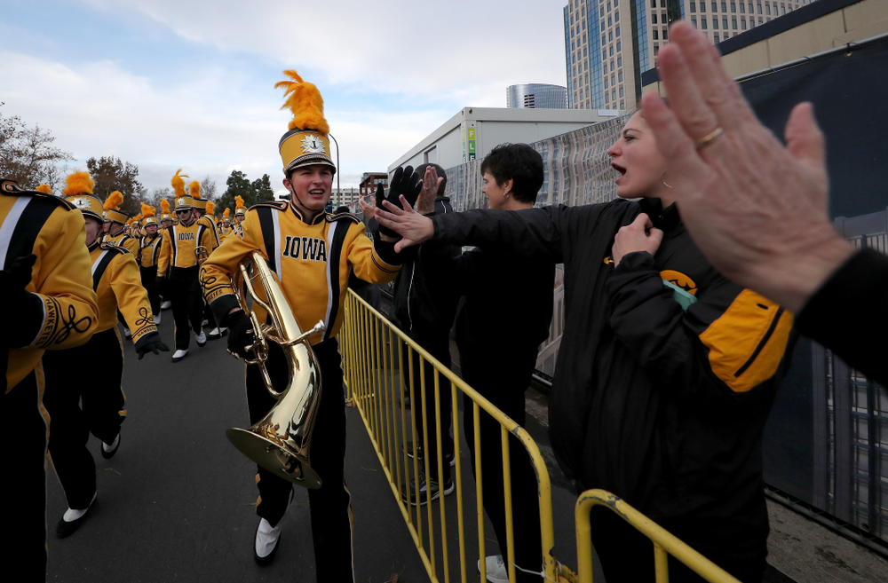 The Hawkeye Marching Band and the Iowa Spirit Squad march in the Holiday Bowl Parade Thursday, December 26, 2019 in San Diego. (Brian Ray/hawkeyesports.com)