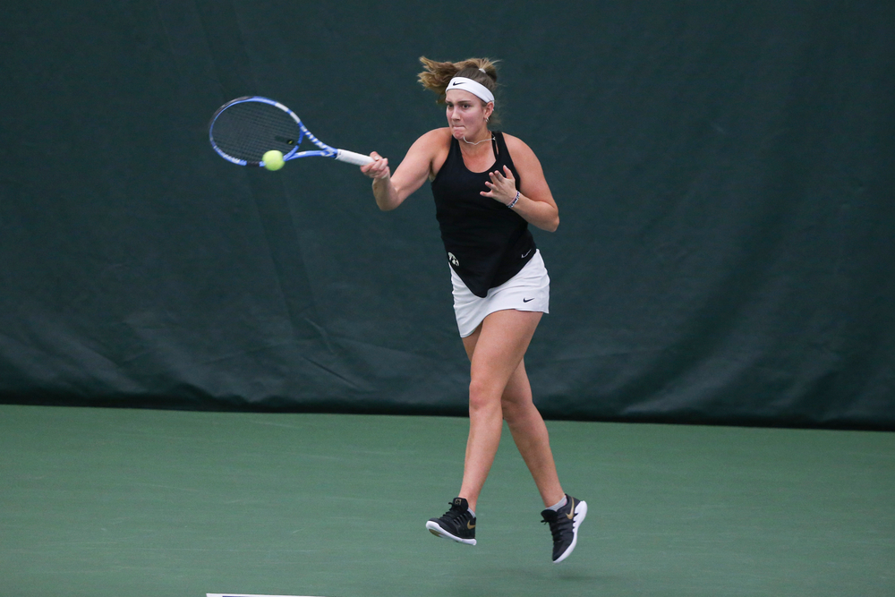 Iowa’s Ashleigh Jacobs returns a hit during the Iowa women’s tennis meet vs DePaul on Friday, February 21, 2020 at the Hawkeye Tennis and Recreation Complex. (Lily Smith/hawkeyesports.com)