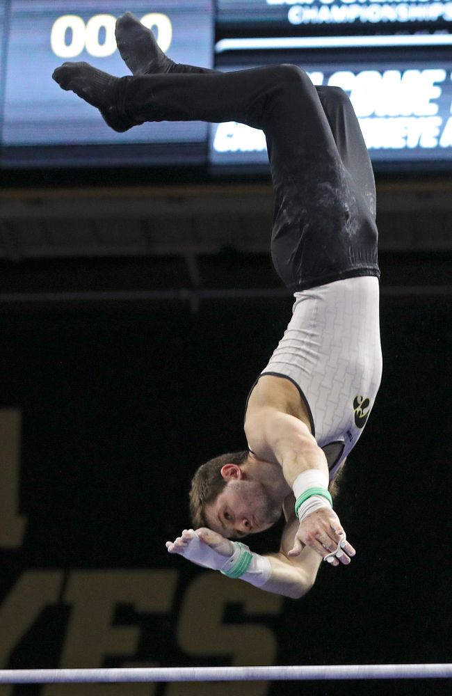 Iowa's Rogelio Vazquez competes in the horizontal bar during the second day of the Big Ten Men's Gymnastics Championships at Carver-Hawkeye Arena in Iowa City on Saturday, Apr. 6, 2019. (Stephen Mally/hawkeyesports.com)