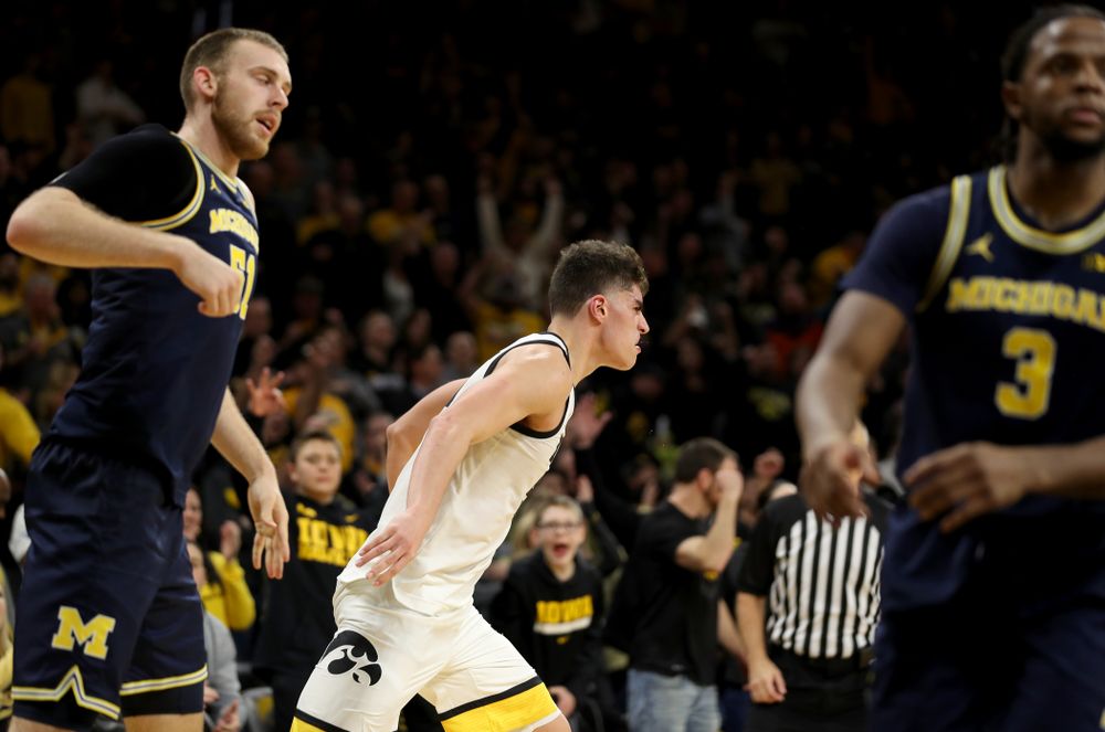 Iowa Hawkeyes forward Luka Garza (55) knocks down a shot against the Michigan Wolverines Friday, January 17, 2020 at Carver-Hawkeye Arena. (Brian Ray/hawkeyesports.com)