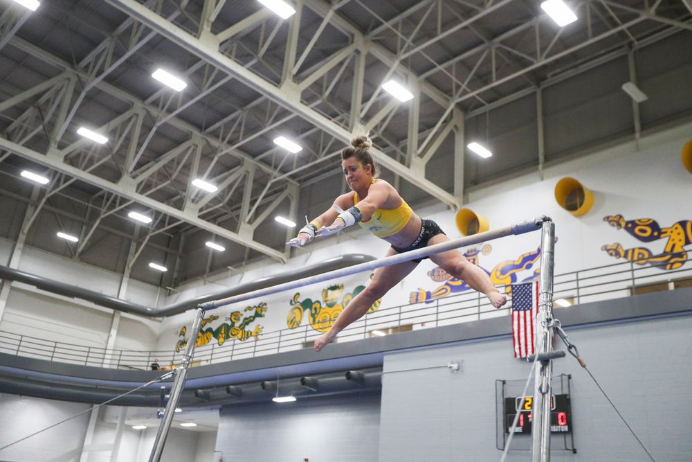Maddie Kampschroeder performs on the uneven bars during the Iowa women’s gymnastics Black and Gold Intraquad Meet on Saturday, December 7, 2019 at the UI Field House. (Lily Smith/hawkeyesports.com)