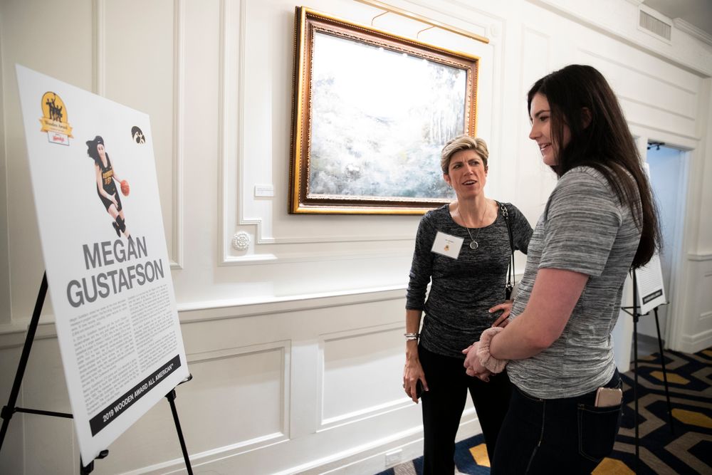 Iowa Hawkeyes forward Megan Gustafson (10) and associate head coach Jan Jensen during the Wooden Award DukeÕs Dinner Thursday, April 11, 2019 at the LA Athletic Club. (Brian Ray/hawkeyesports.com)
