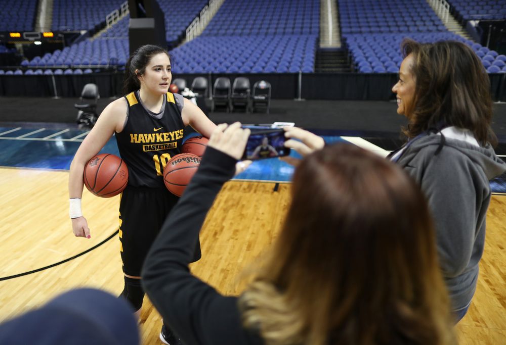 Iowa Hawkeyes forward Megan Gustafson (10) talks with the ESPN Crew following practice for their Sweet 16 matchup against NC State Friday, March 29, 2019 at the Greensboro Coliseum in Greensboro, NC.(Brian Ray/hawkeyesports.com)