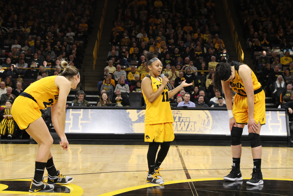 Iowa Hawkeyes forward Megan Gustafson (10), guard Tania Davis (11), and forward Hannah Stewart (21) during senior day ceremonies following their game against the Northwestern Wildcats Sunday, March 3, 2019 at Carver-Hawkeye Arena. (Brian Ray/hawkeyesports.com)