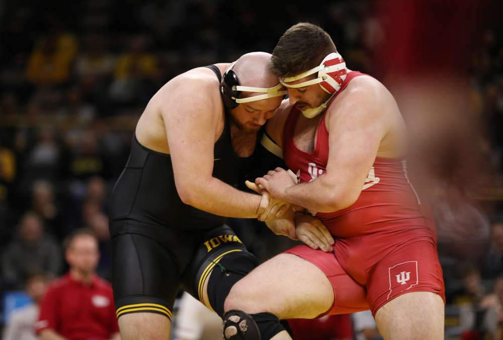 Iowa's Sam Stoll wrestles Indiana's Fletcher Miller at heavyweight Friday, February 15, 2019 at Carver-Hawkeye Arena. (Brian Ray/hawkeyesports.com)