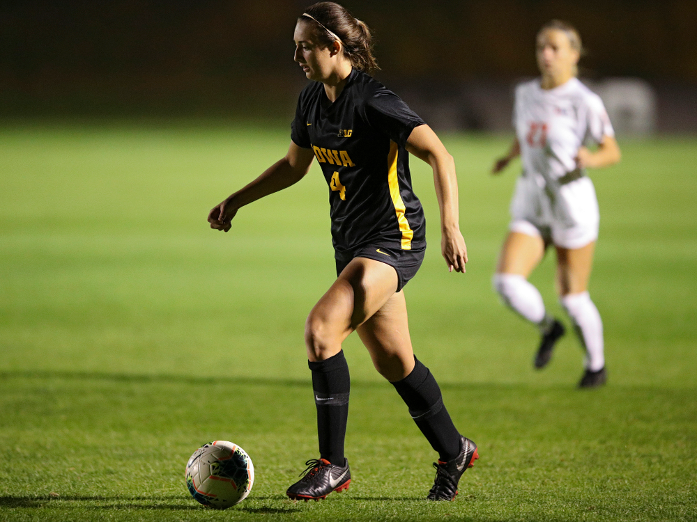 Iowa forward Kaleigh Haus (4) moves with the ball during the first half of their match against Illinois at the Iowa Soccer Complex in Iowa City on Thursday, Sep 26, 2019. (Stephen Mally/hawkeyesports.com)