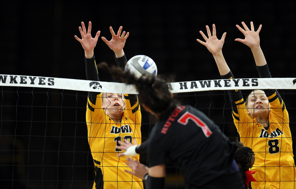 Iowa Hawkeyes middle blocker Hannah Clayton (18) and outside hitter Kyndra Hansen (8) against the Rutgers Scarlet Knights Saturday, November 2, 2019 at Carver-Hawkeye Arena. (Brian Ray/hawkeyesports.com)