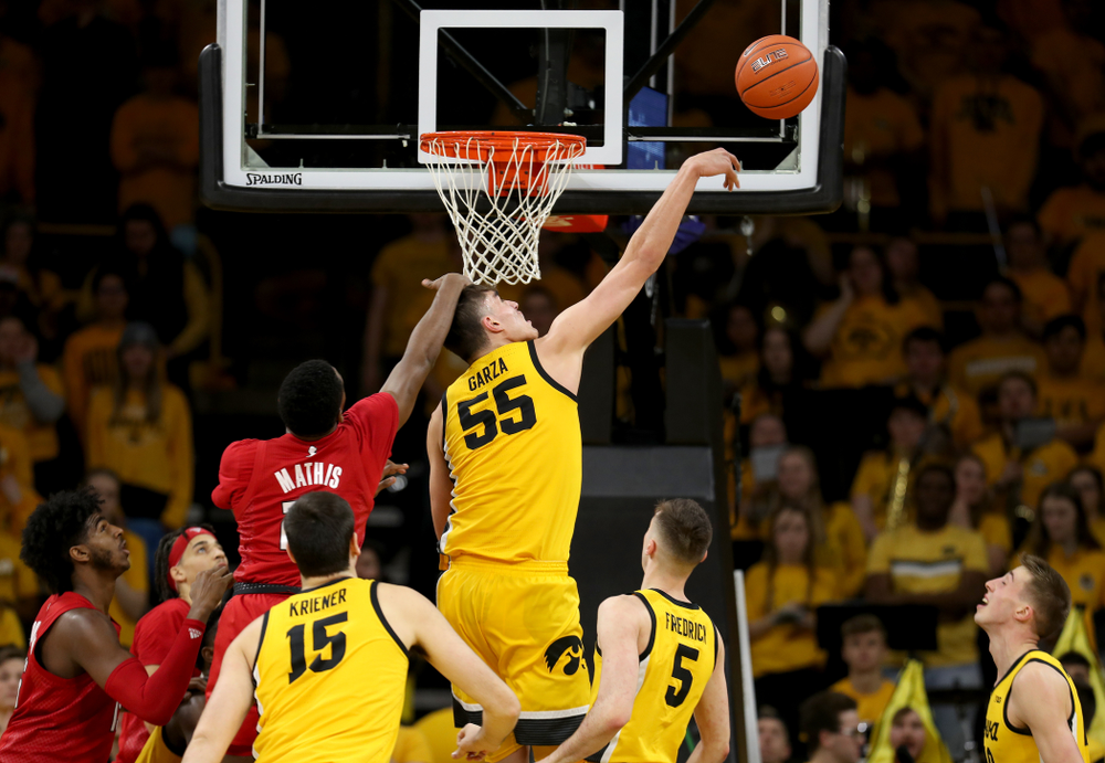 Iowa Hawkeyes forward Luka Garza (55) blocks a shot against the Rutgers Scarlet Knights Wednesday, January 22, 2020 at Carver-Hawkeye Arena. (Brian Ray/hawkeyesports.com)