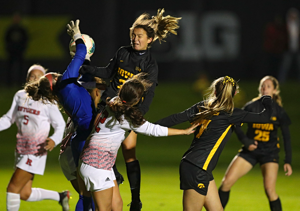 Iowa forward Emma Tokuyama (21) tries to head in a shot during the second half of their match at the Iowa Soccer Complex in Iowa City on Friday, Oct 11, 2019. (Stephen Mally/hawkeyesports.com)