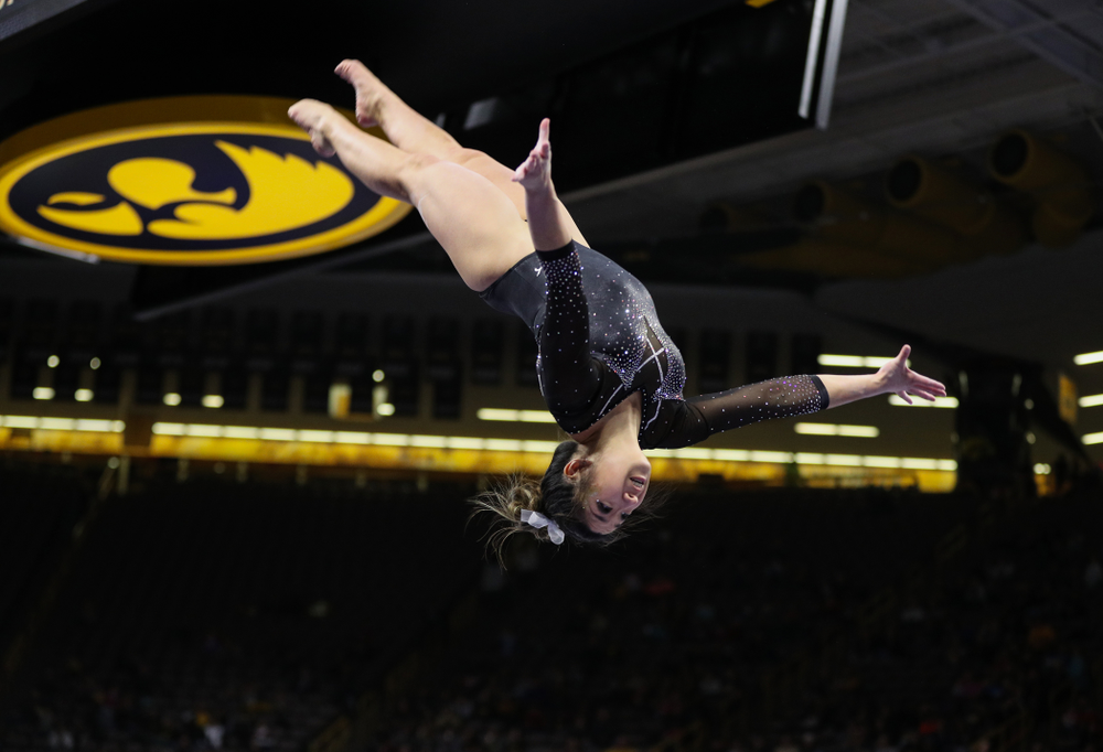 Iowa's Nicole Chow competes on the beem against Illinois Saturday, February 16, 2019 at Carver-Hawkeye Arena. (Brian Ray/hawkeyesports.com)