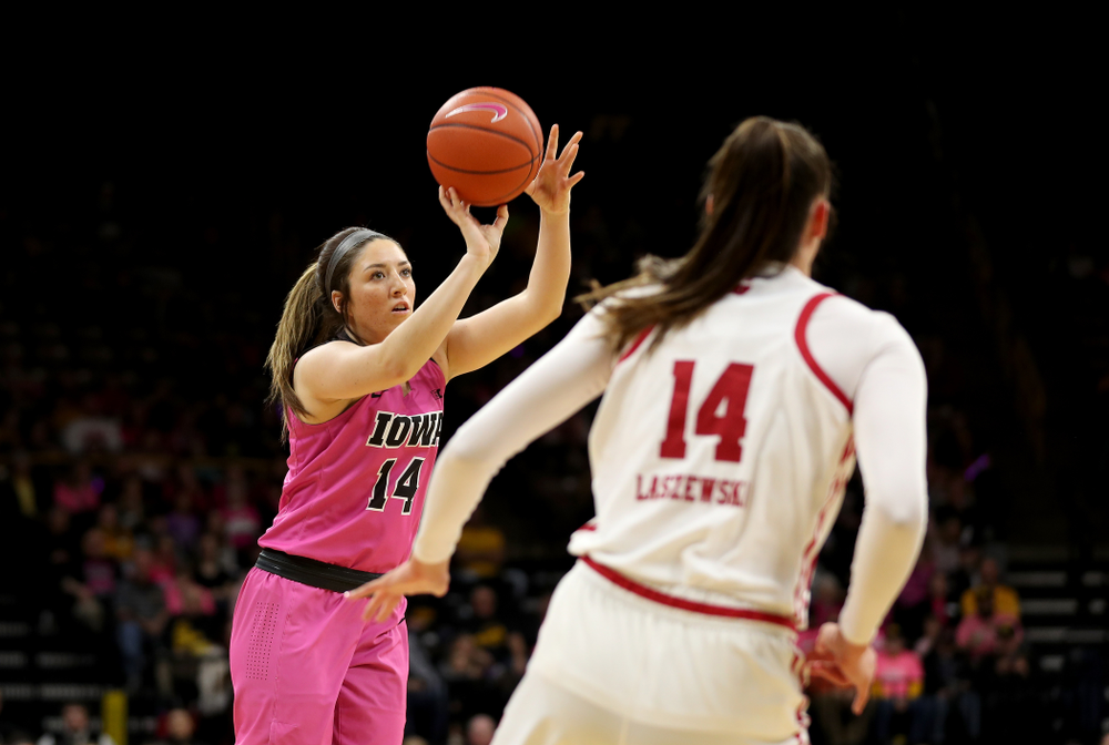 Iowa Hawkeyes forward McKenna Warnock (14) against the Wisconsin Badgers Sunday, February 16, 2020 at Carver-Hawkeye Arena. (Brian Ray/hawkeyesports.com)