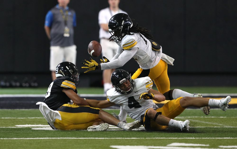 Iowa Hawkeyes defensive back Devonte Young (17) and defensive back Dane Belton (4) During Fall Camp Practice No. 6 Thursday, August 8, 2019 at the Ronald D. and Margaret L. Kenyon Football Practice Facility. (Brian Ray/hawkeyesports.com)