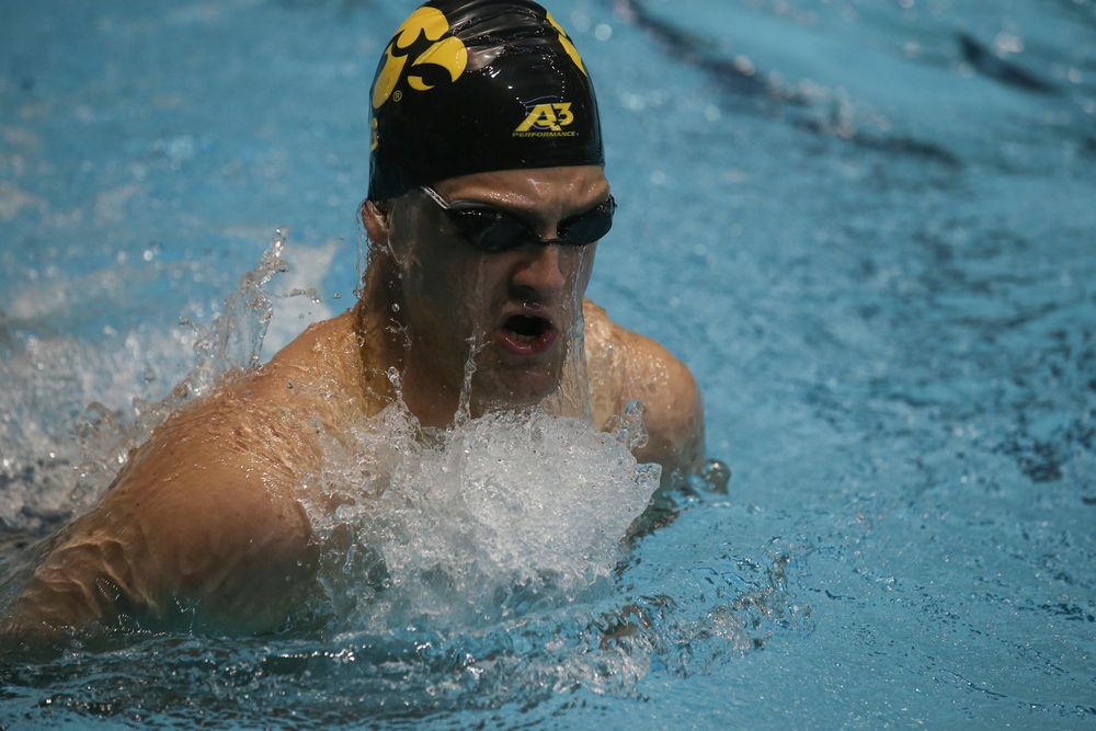 Iowa’s Caleb Babb swims the 100-yard breaststroke during the Iowa swimming and diving meet vs Notre Dame and Illinois on Saturday, January 11, 2020 at the Campus Recreation and Wellness Center. (Lily Smith/hawkeyesports.com)
