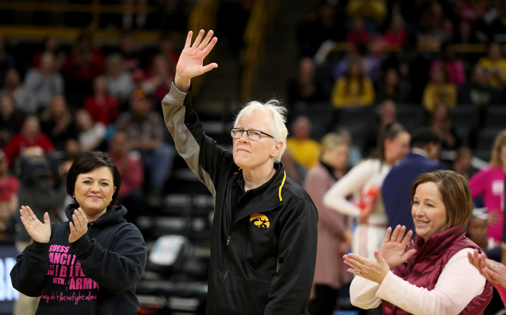 Women affected by cancer are introduced during the Iowa Hawkeyes game against the Wisconsin Badgers Sunday, February 16, 2020 at Carver-Hawkeye Arena. (Brian Ray/hawkeyesports.com)