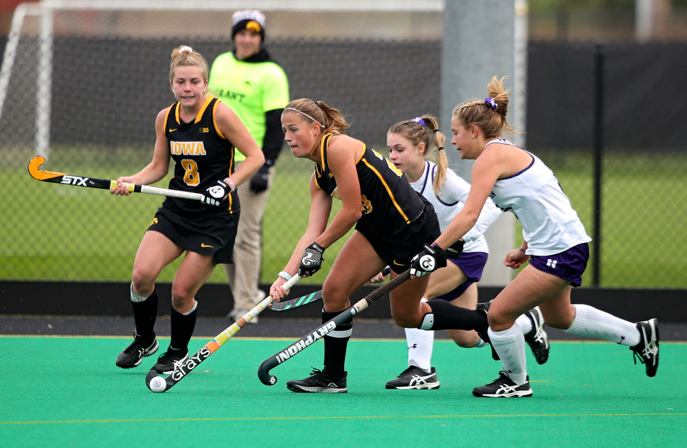 Iowa’s Sophie Sunderland (20) moves with the ball during the third quarter of their game at Grant Field in Iowa City on Saturday, Oct 26, 2019. (Stephen Mally/hawkeyesports.com)