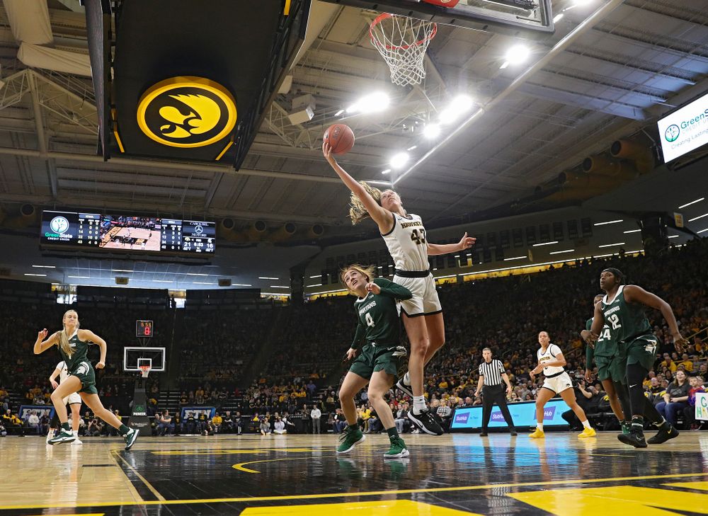 Iowa Hawkeyes forward Amanda Ollinger (43) pulls in a rebound during the second quarter of their game at Carver-Hawkeye Arena in Iowa City on Sunday, January 26, 2020. (Stephen Mally/hawkeyesports.com)
