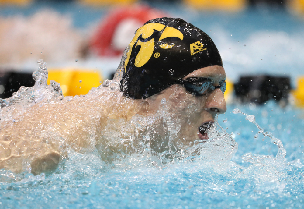 Iowa's Jackson Kuhlers swims the 200 yard butterfly during a double dual against Wisconsin and Northwestern Saturday, January 19, 2019 at the Campus Recreation and Wellness Center. (Brian Ray/hawkeyesports.com)