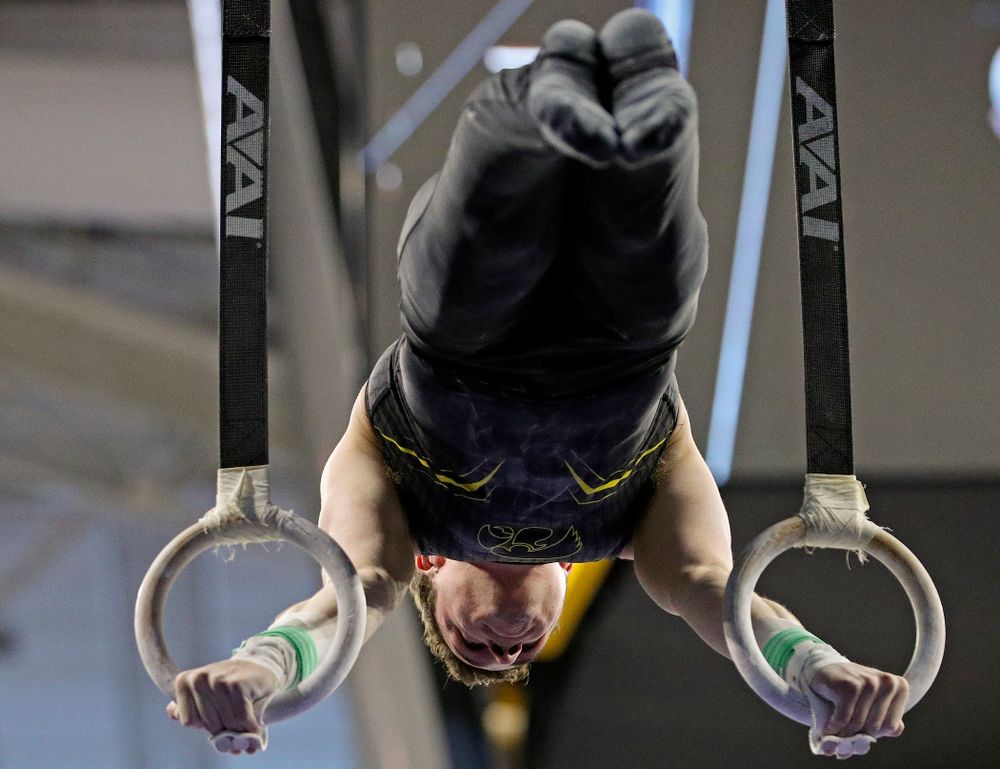Iowa's Jake Brodarzon competes in the rings during the first day of the Big Ten Men's Gymnastics Championships at Carver-Hawkeye Arena in Iowa City on Friday, Apr. 5, 2019. (Stephen Mally/hawkeyesports.com)