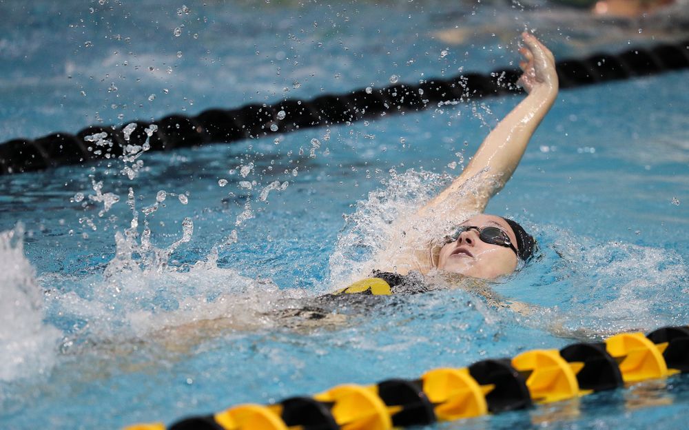 Iowa's Samantha Sauer competes in the 400-yard medley relay during a meet against Michigan and Denver at the Campus Recreation and Wellness Center on November 3, 2018. (Tork Mason/hawkeyesports.com)