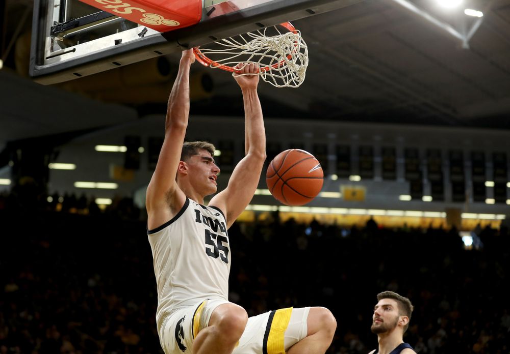 Iowa Hawkeyes forward Luka Garza (55) dunks the ball against Penn State Saturday, February 29, 2020 at Carver-Hawkeye Arena. (Brian Ray/hawkeyesports.com)