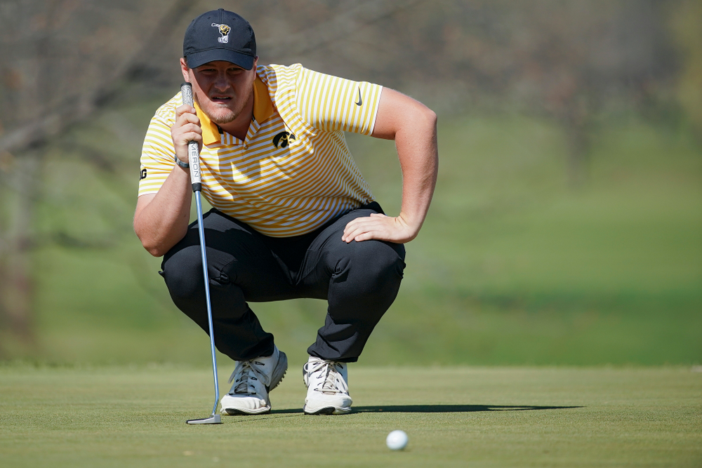 Iowa's Alex Schaake lines up a putt during the third round of the Hawkeye Invitational at Finkbine Golf Course in Iowa City on Sunday, Apr. 21, 2019. (Stephen Mally/hawkeyesports.com)