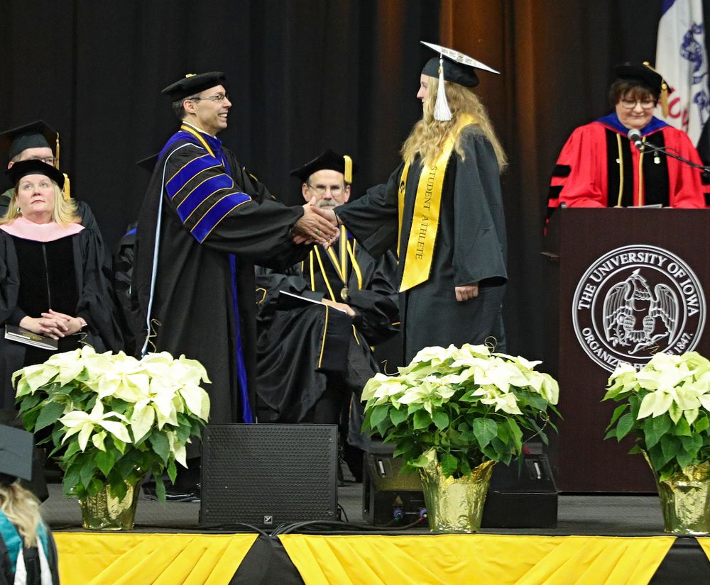 Iowa Track and Field’s Allison Wahrman during the College of Liberal Arts and Sciences and University College Fall 2019 Commencement ceremony at Carver-Hawkeye Arena in Iowa City on Saturday, December 21, 2019. (Stephen Mally/hawkeyesports.com)