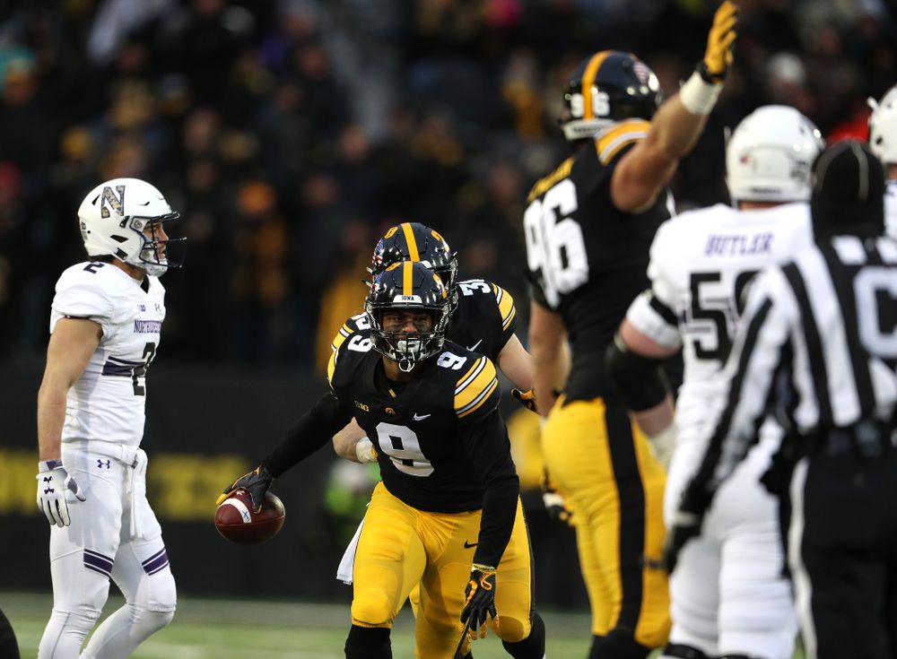 Iowa Hawkeyes defensive back Geno Stone (9) intercepts a pass against the Northwestern Wildcats Saturday, November 10, 2018 at Kinnick Stadium. (Brian Ray/hawkeyesports.com)