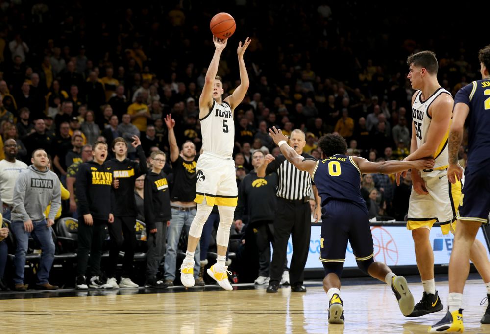 Iowa Hawkeyes guard CJ Fredrick (5) knocks down a three point basket against the Michigan Wolverines Friday, January 17, 2020 at Carver-Hawkeye Arena. (Brian Ray/hawkeyesports.com)