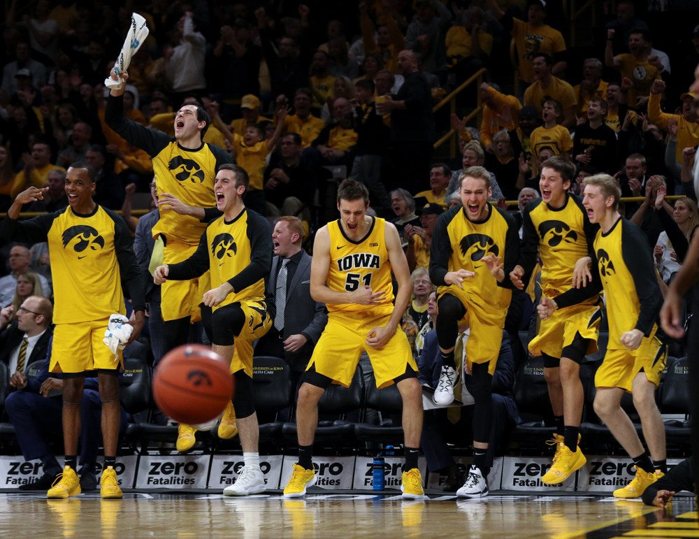 The Iowa Hawkeyes celebrate after winning a aeagainst the Wisconsin Badgers Friday, November 30, 2018 at Carver-Hawkeye Arena. (Brian Ray/hawkeyesports.com)