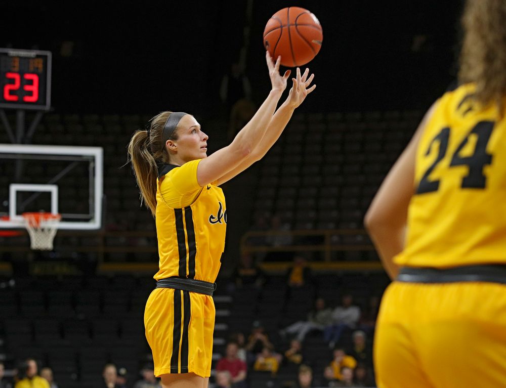 Iowa Hawkeyes guard Makenzie Meyer (3) makes a 3-pointer during the third quarter of their game at Carver-Hawkeye Arena in Iowa City on Thursday, January 23, 2020. (Stephen Mally/hawkeyesports.com)