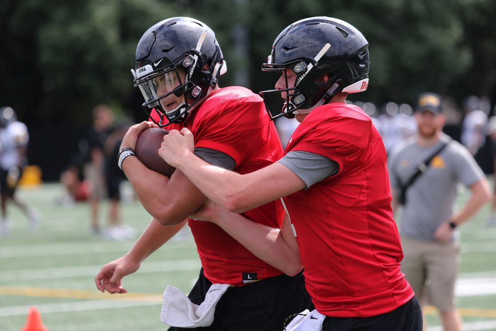 Iowa Hawkeyes quarterback Nathan Stanley (4) and quarterback Spencer Petras (7) during practice No. 4 of Fall Camp Monday, August 6, 2018 at the Hansen Football Performance Center. (Brian Ray/hawkeyesports.com)
