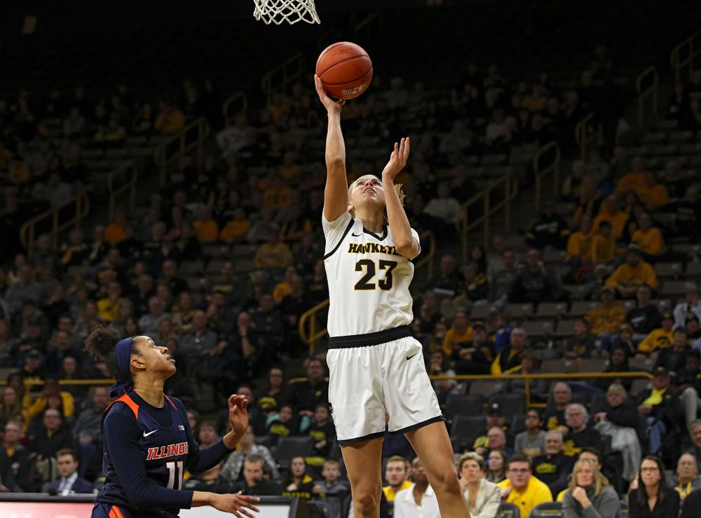 Iowa Hawkeyes forward Logan Cook (23) scores a basket during the fourth quarter of their game at Carver-Hawkeye Arena in Iowa City on Tuesday, December 31, 2019. (Stephen Mally/hawkeyesports.com)