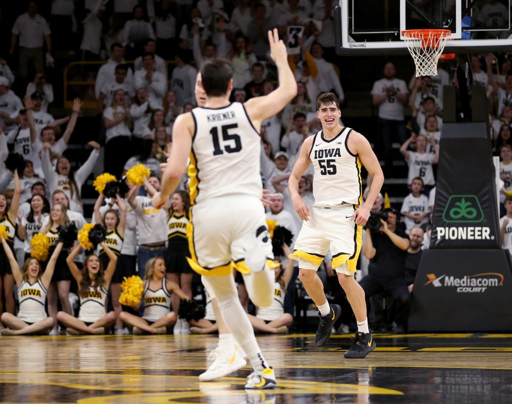 Iowa Hawkeyes forward Luka Garza (55) celebrates a three point basket against the Illinois Fighting Illini Sunday, February 2, 2020 at Carver-Hawkeye Arena. (Brian Ray/hawkeyesports.com)