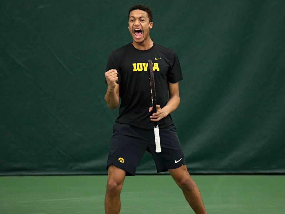 Iowa’s Oliver Okonkwo celebrates a point during his doubles match at the Hawkeye Tennis and Recreation Complex in Iowa City on Friday, March 6, 2020. (Stephen Mally/hawkeyesports.com)