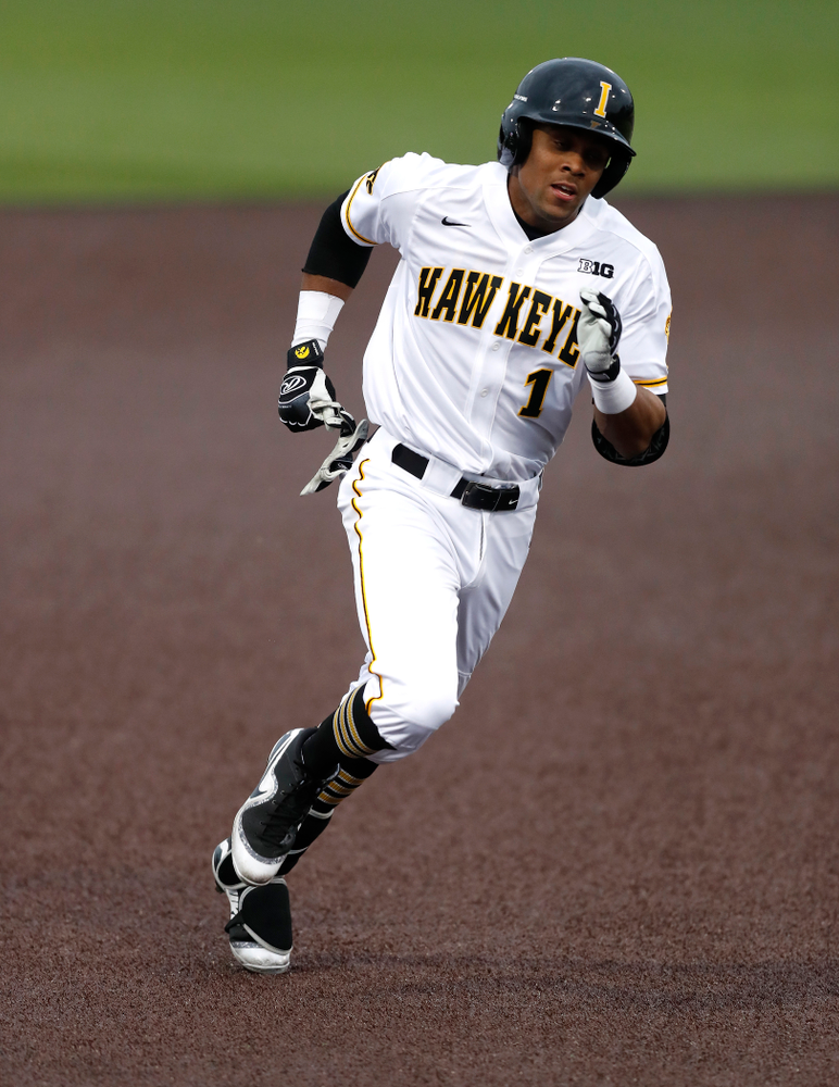 Iowa Hawkeyes third baseman Lorenzo Elion (1) triples against Coe College Wednesday, April 11, 2018 at Duane Banks Field. (Brian Ray/hawkeyesports.com)
