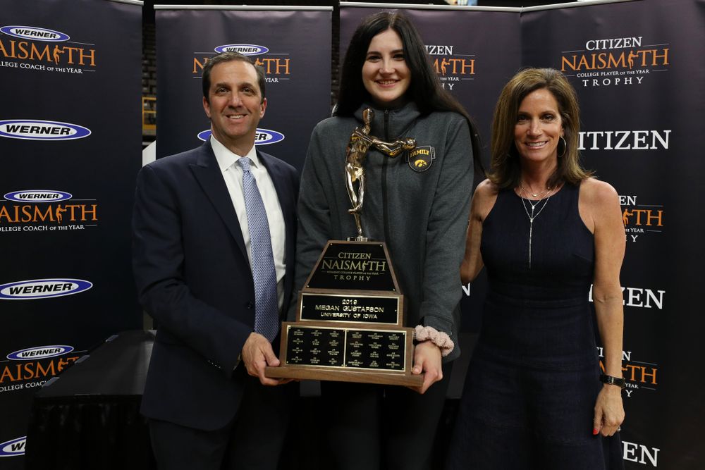 Iowa Hawkeyes forward Megan Gustafson (10) with the Naismith Player Of The Year Trophy during the teamÕs Celebr-Eight event Wednesday, April 24, 2019 at Carver-Hawkeye Arena. (Brian Ray/hawkeyesports.com)