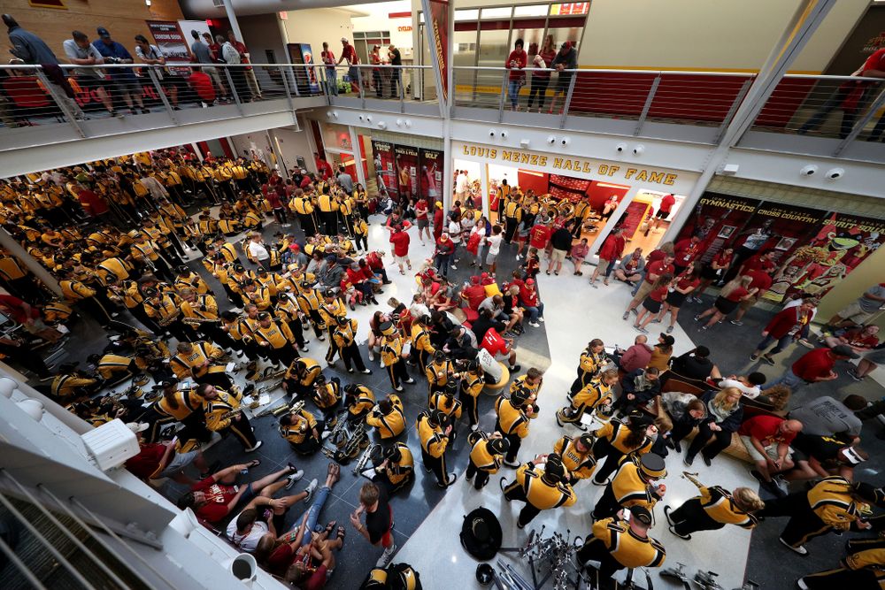 The marching bands take shelter during a weather delay in the Iowa Hawkeyes game against the Iowa State Cyclones Saturday, September 14, 2019 at Jack Trice Stadium in Ames, Iowa. (Brian Ray/hawkeyesports.com)