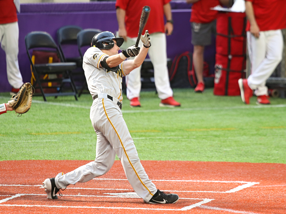 Iowa Hawkeyes outfielder Ben Norman (9) gets a hit during the seventh inning of their CambriaCollegeClassic game at U.S. Bank Stadium in Minneapolis, Minn. on Friday, February 28, 2020. (Stephen Mally/hawkeyesports.com)